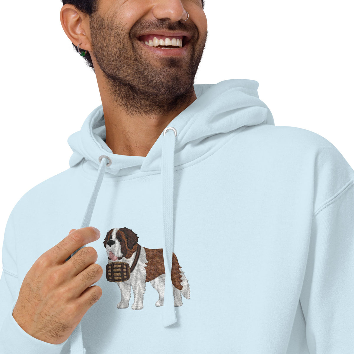 Premium hoodie embroidered with a detailed Saint Bernard with a barrel around its neck by Lucy and Norman.