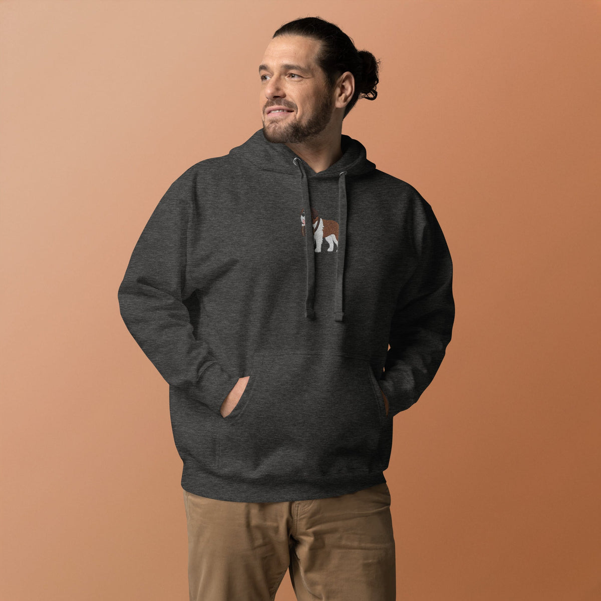 Premium hoodie embroidered with a detailed Saint Bernard with a barrel around its neck by Lucy and Norman.