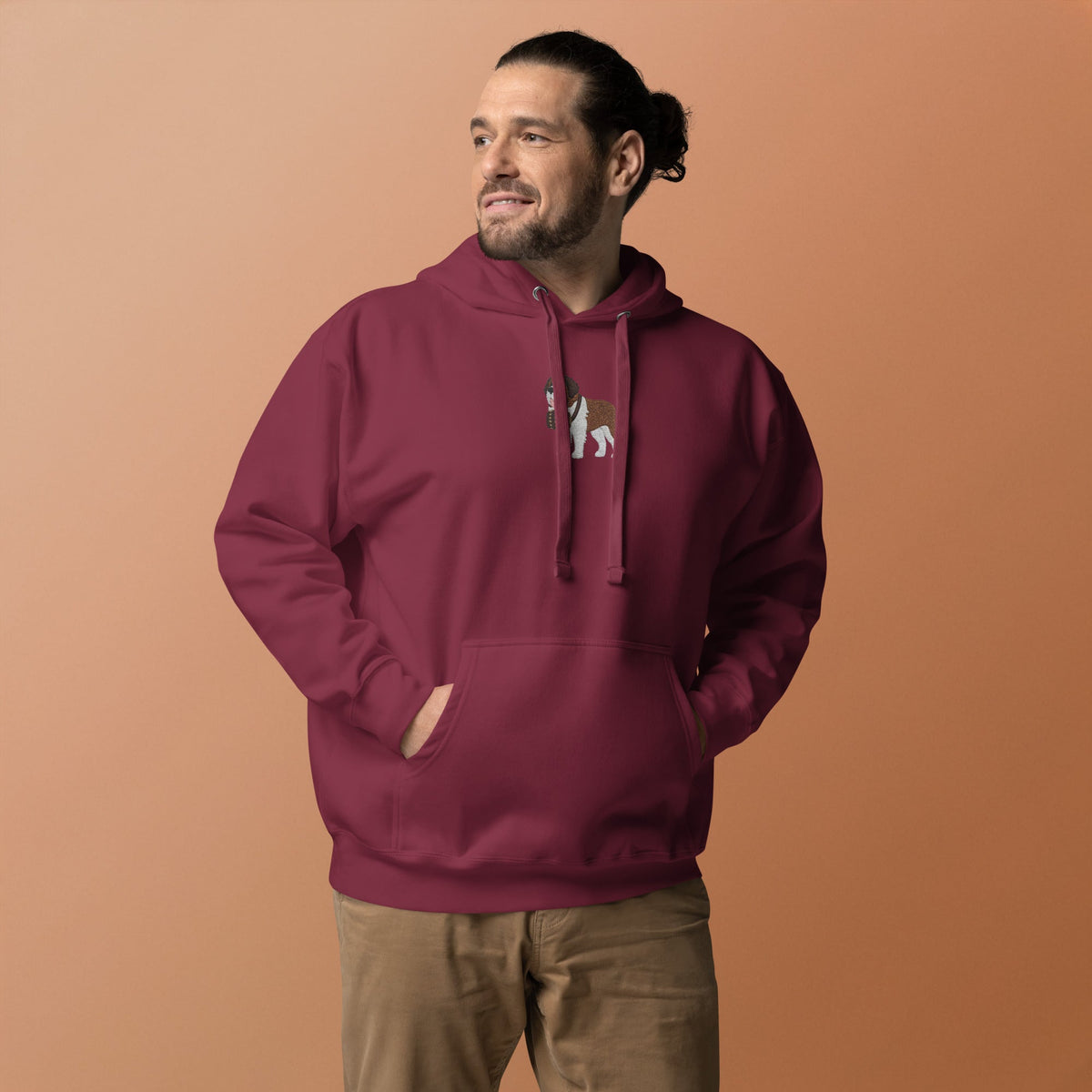 Premium hoodie embroidered with a detailed Saint Bernard with a barrel around its neck by Lucy and Norman.
