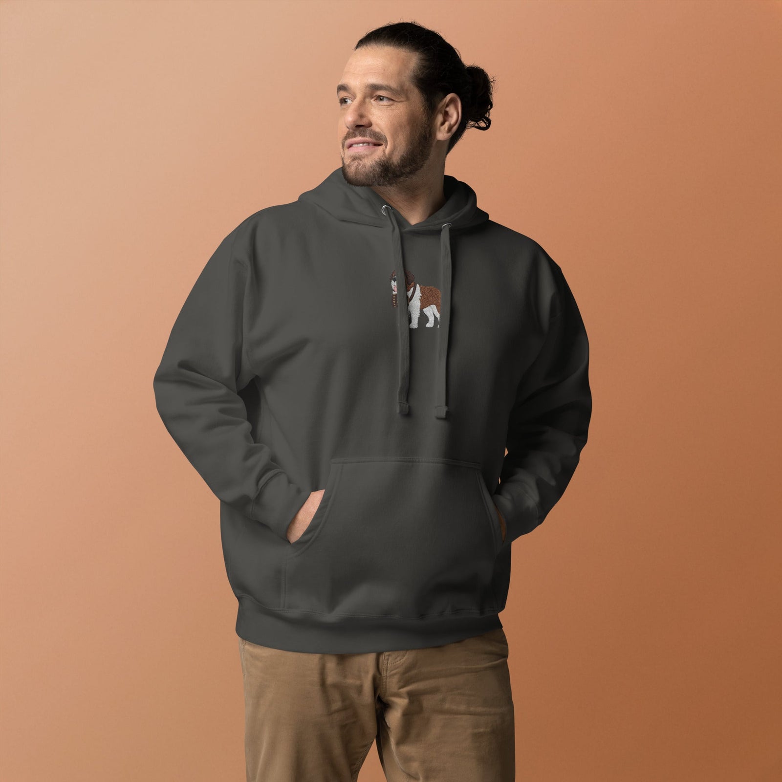 Premium hoodie embroidered with a detailed Saint Bernard with a barrel around its neck by Lucy and Norman.