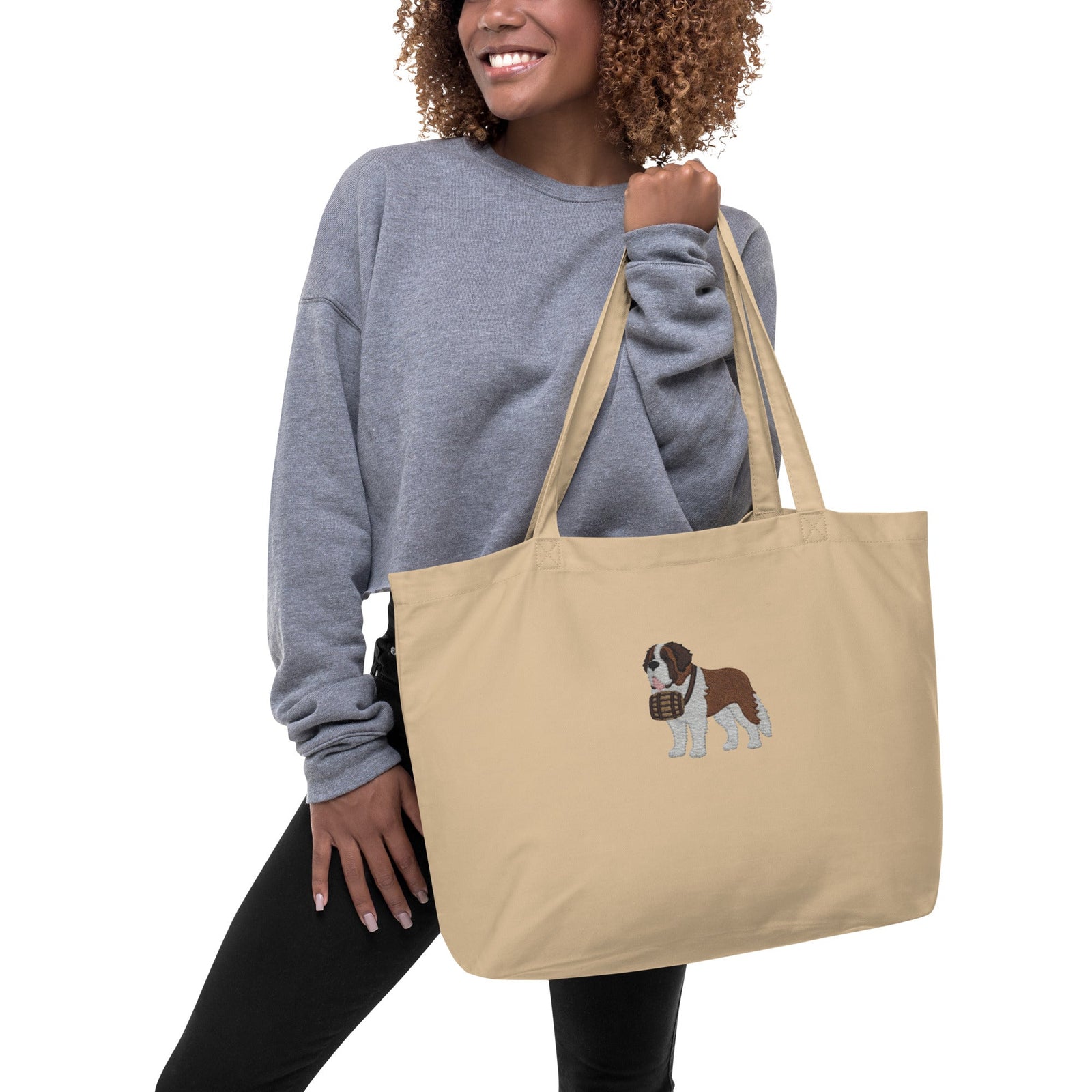 Large beige organic tote bag embroidered with a detailed Saint Bernard with a barrel around its neck by Lucy and Norman.