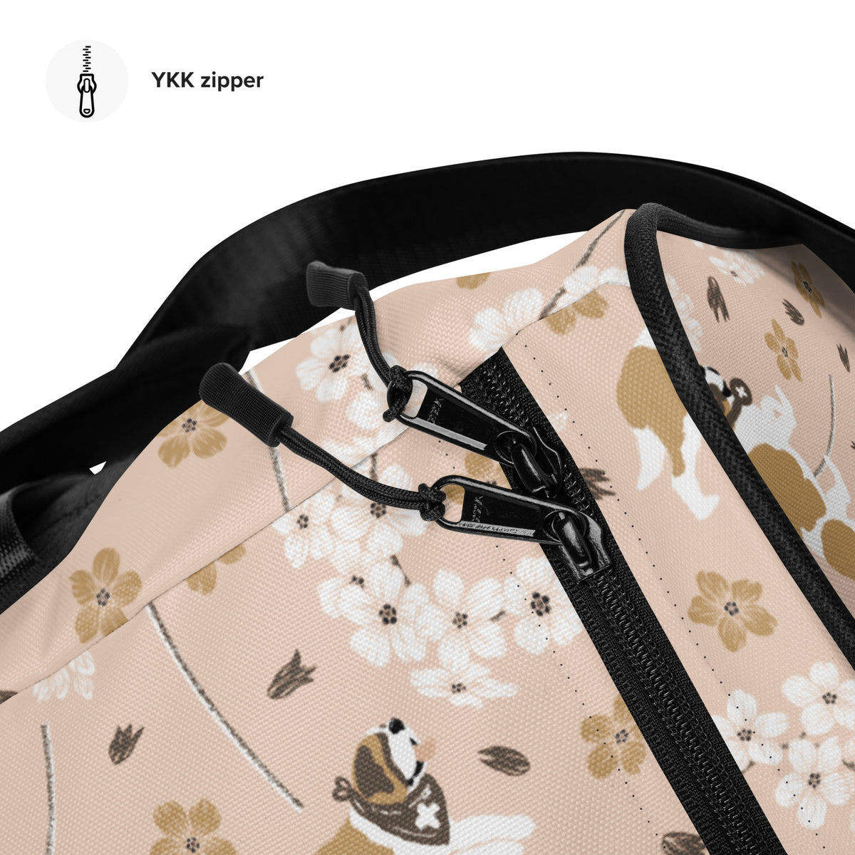 Floral Saint Bernard duffle bag with adjustable padded black shoulder strap, dual carry handles, zippered compartments, and mesh side pocket in white, brown, gold, and soft pink.