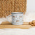Lightweight 12 oz enamel camp mug. Features a modern pattern of Saint Bernard dogs, mountains and pine trees on a white background by Lucy and Norman