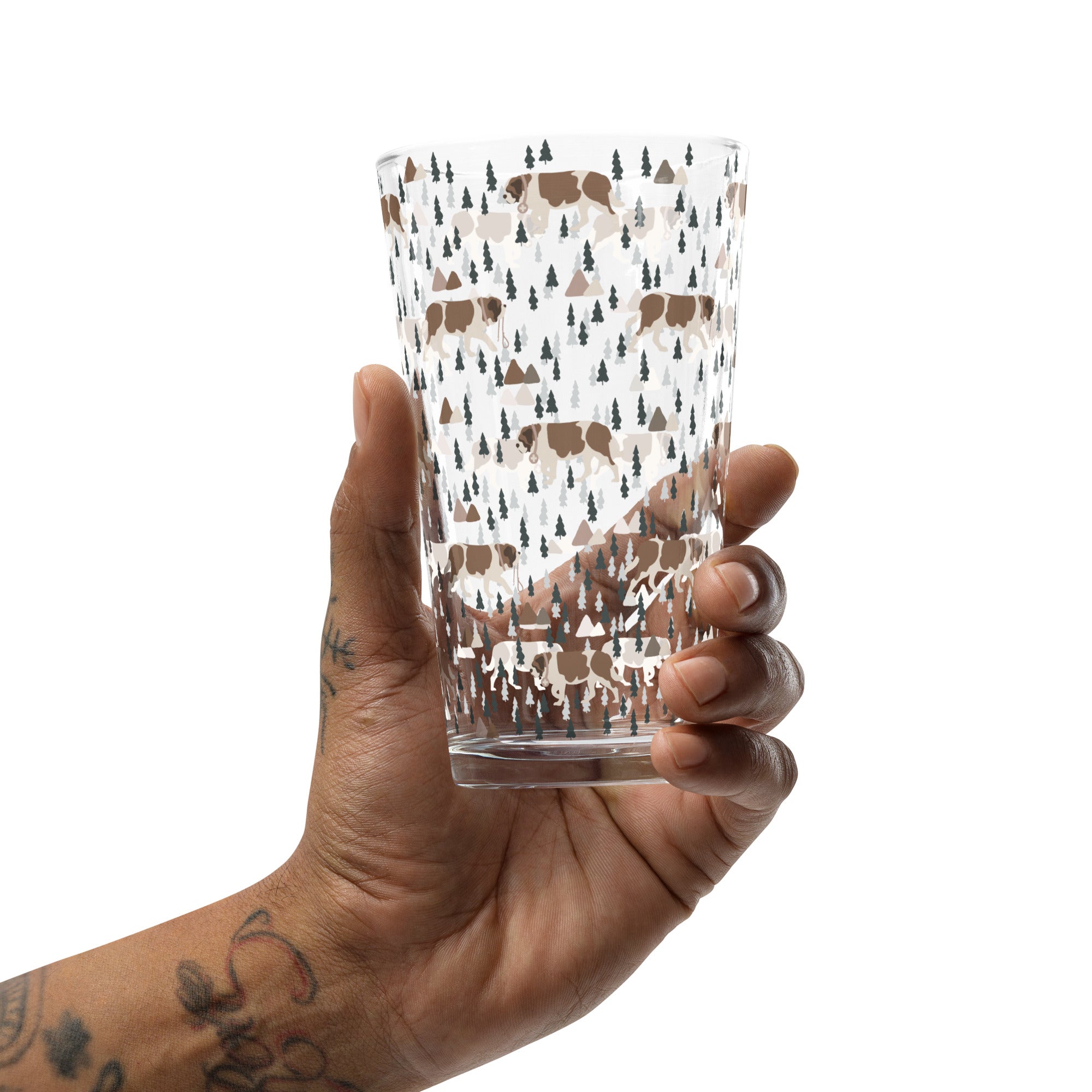 16 oz shaker pint glass with a modern pattern of Saint Bernard dogs, mountains and pine trees by Lucy and Norman