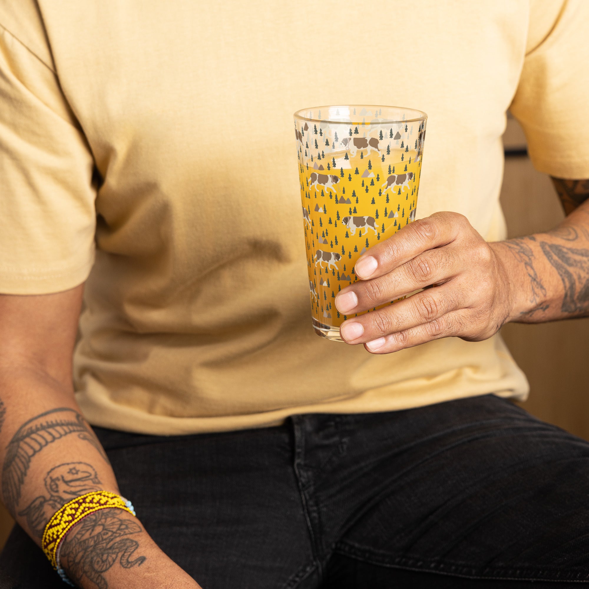 16 oz shaker pint glass with a modern pattern of Saint Bernard dogs, mountains and pine trees by Lucy and Norman