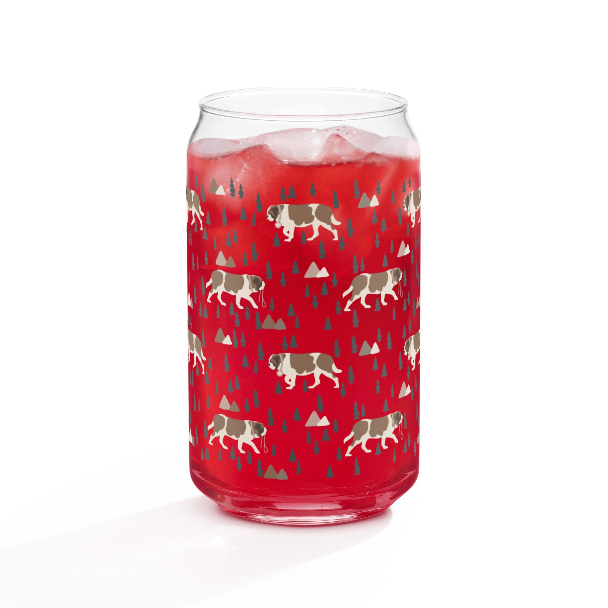 16 oz can-shaped glass tumbler. Features a modern pattern of Saint Bernard dogs, mountains and pine trees by Lucy and Norman