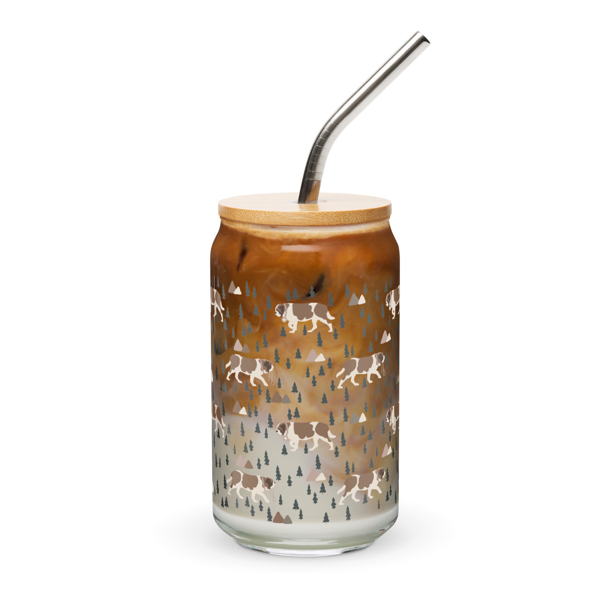 16 oz can-shaped glass tumbler, bamboo wood lid and metal straw. Features a modern pattern of Saint Bernard dogs, mountains and pine trees by Lucy and Norman
