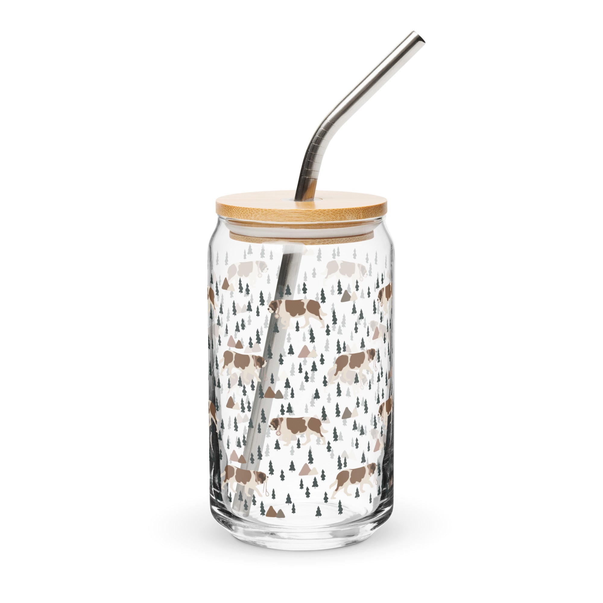 16 oz can-shaped glass tumbler, bamboo wood lid and metal straw. Features a modern pattern of Saint Bernard dogs, mountains and pine trees by Lucy and Norman