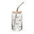 16 oz can-shaped glass tumbler, bamboo wood lid and metal straw. Features a modern pattern of Saint Bernard dogs, mountains and pine trees by Lucy and Norman