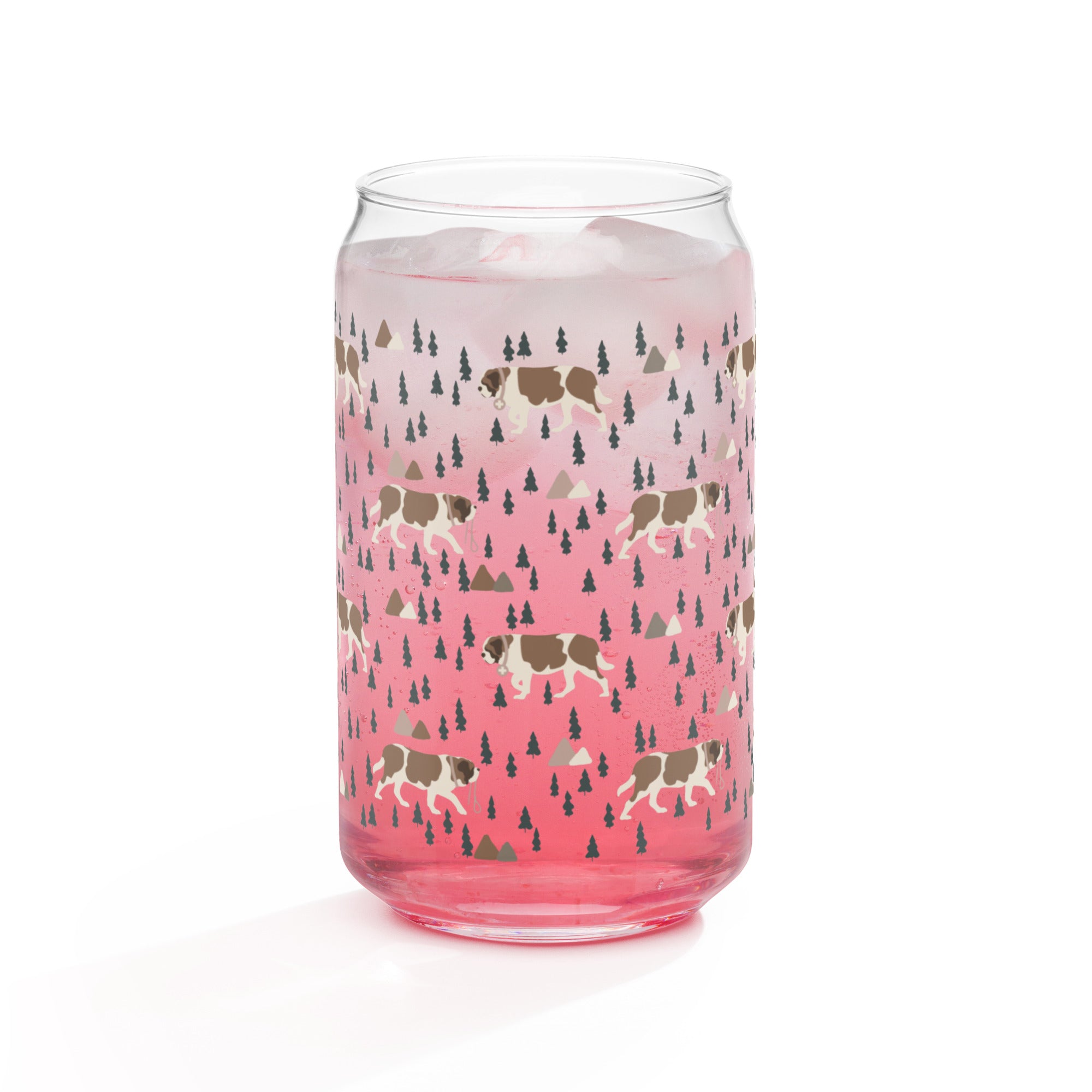 16 oz can-shaped glass tumbler. Features a modern pattern of Saint Bernard dogs, mountains and pine trees by Lucy and Norman