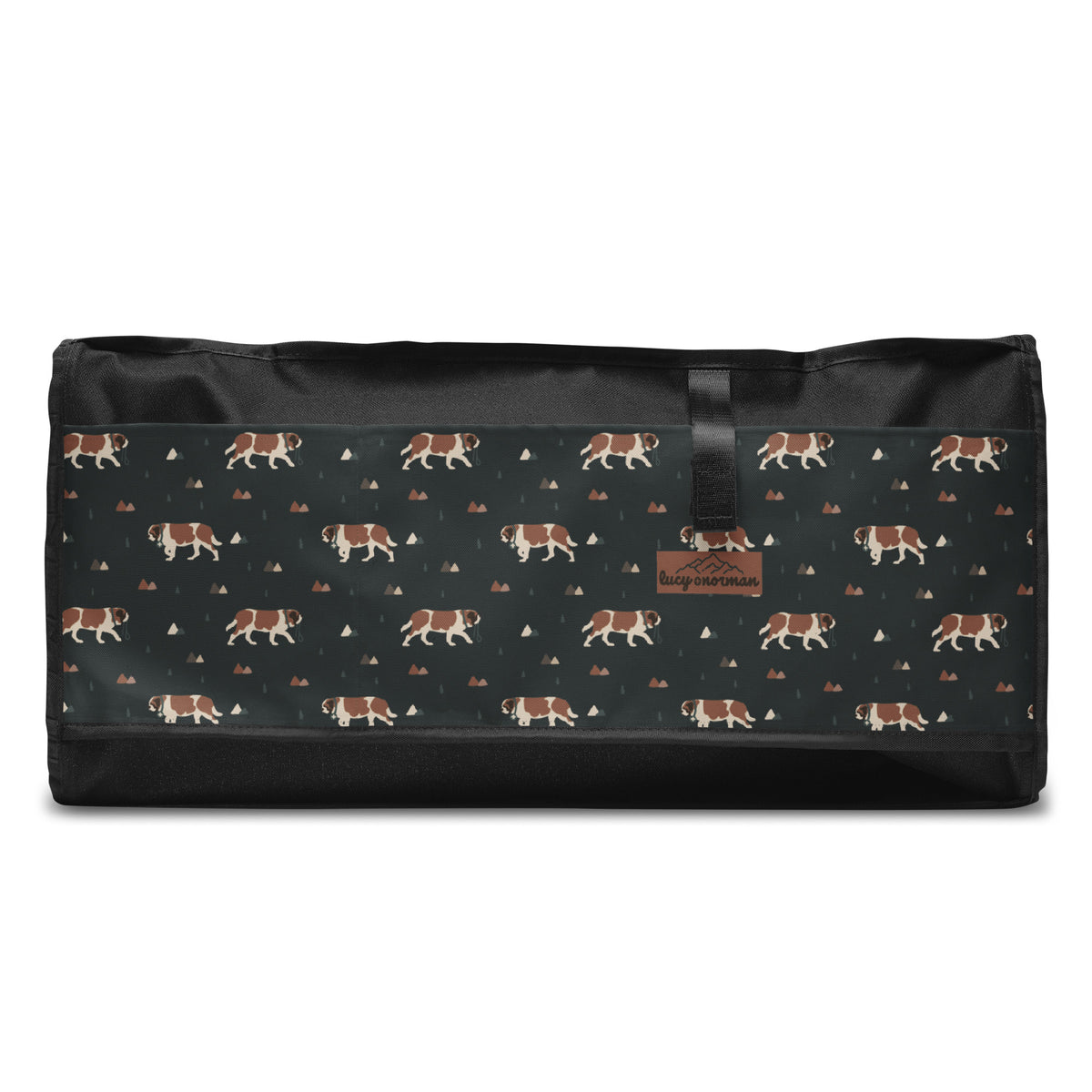 Green Mountain Saint Bernard duffle bag with adjustable padded black shoulder strap, handles, zip compartment, and mesh side pocket on dark green background with mountains, pines and dog pattern.