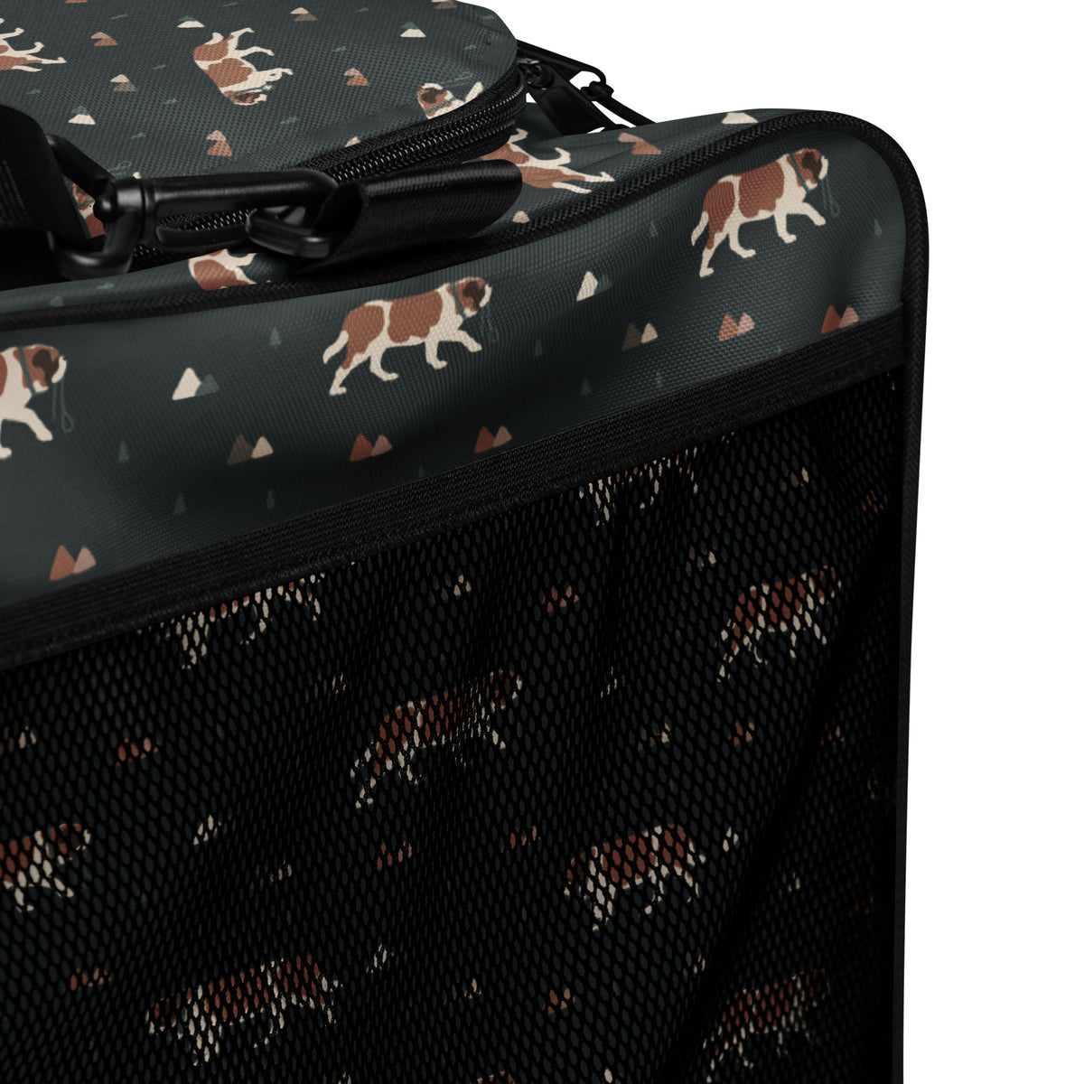 Green Mountain Saint Bernard duffle bag with adjustable padded black shoulder strap, handles, zip compartment, and mesh side pocket on dark green background with mountains, pines and dog pattern.