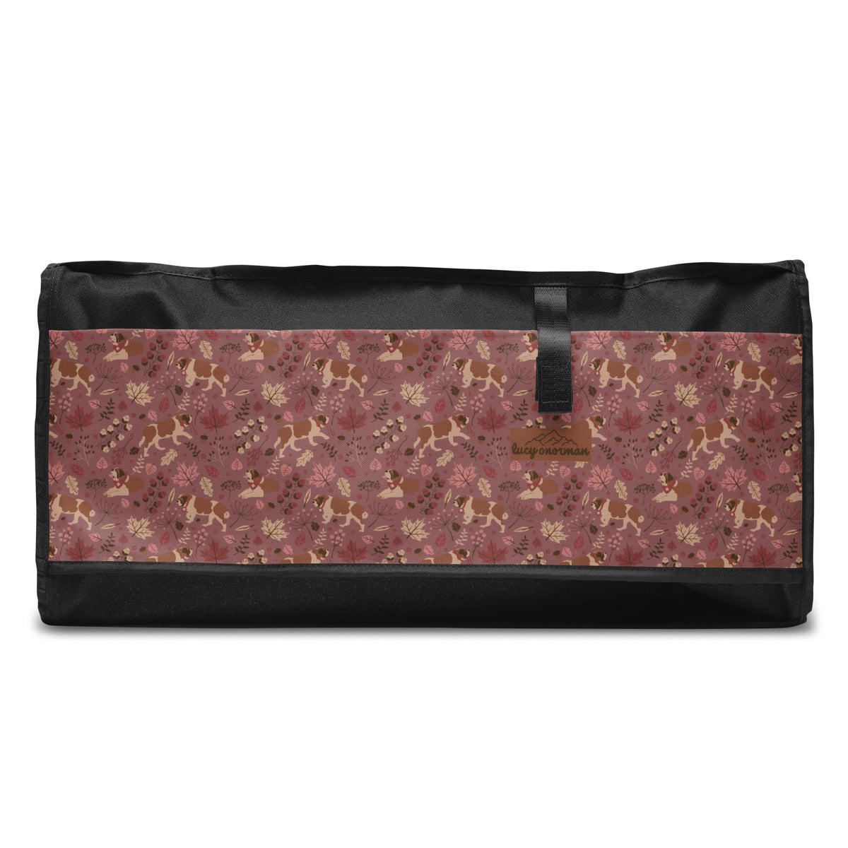 Rosy Fall Saint Bernard floral duffle bag in warm pink, brown, and autumn leaf tones with black padded shoulder strap, handles, zip compartment, and mesh side pocket.