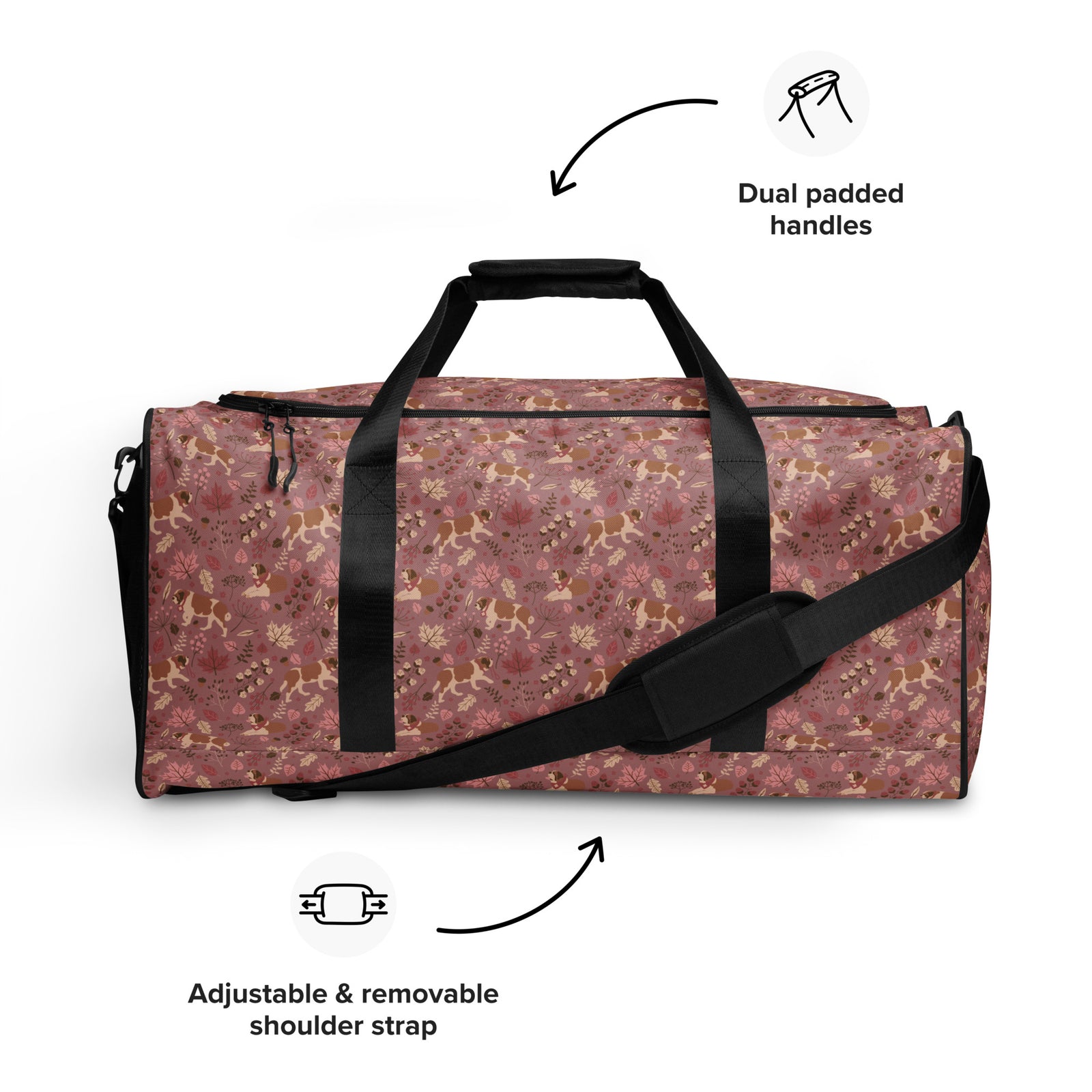 Rosy Fall Saint Bernard floral duffle bag in warm pink, brown, and autumn leaf tones with black padded shoulder strap, handles, zip compartment, and mesh side pocket.