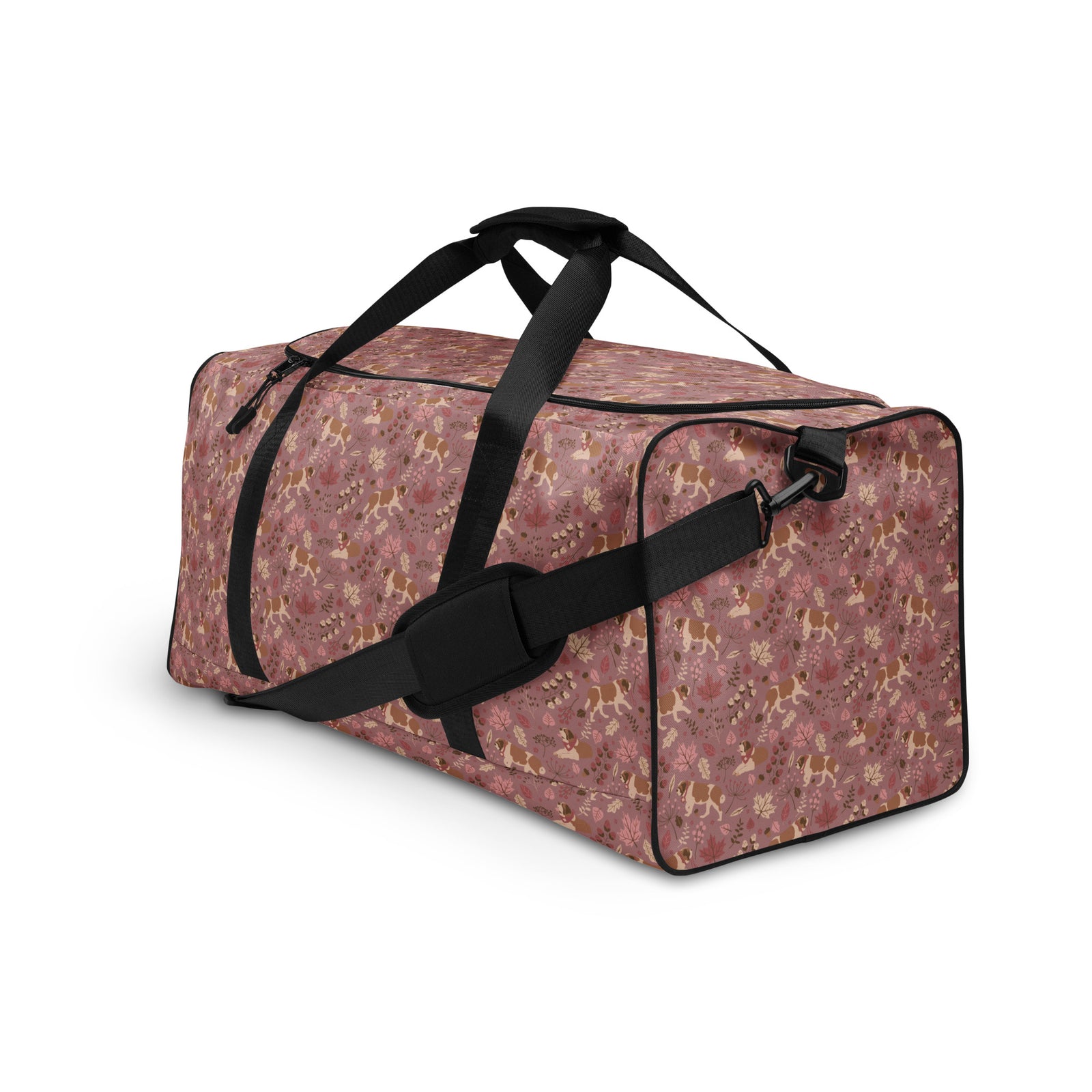 Rosy Fall Saint Bernard floral duffle bag in warm pink, brown, and autumn leaf tones with black padded shoulder strap, handles, zip compartment, and mesh side pocket.