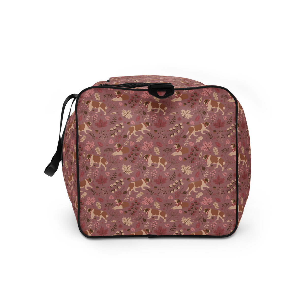 Rosy Fall Saint Bernard floral duffle bag in warm pink, brown, and autumn leaf tones with black padded shoulder strap, handles, zip compartment, and mesh side pocket.