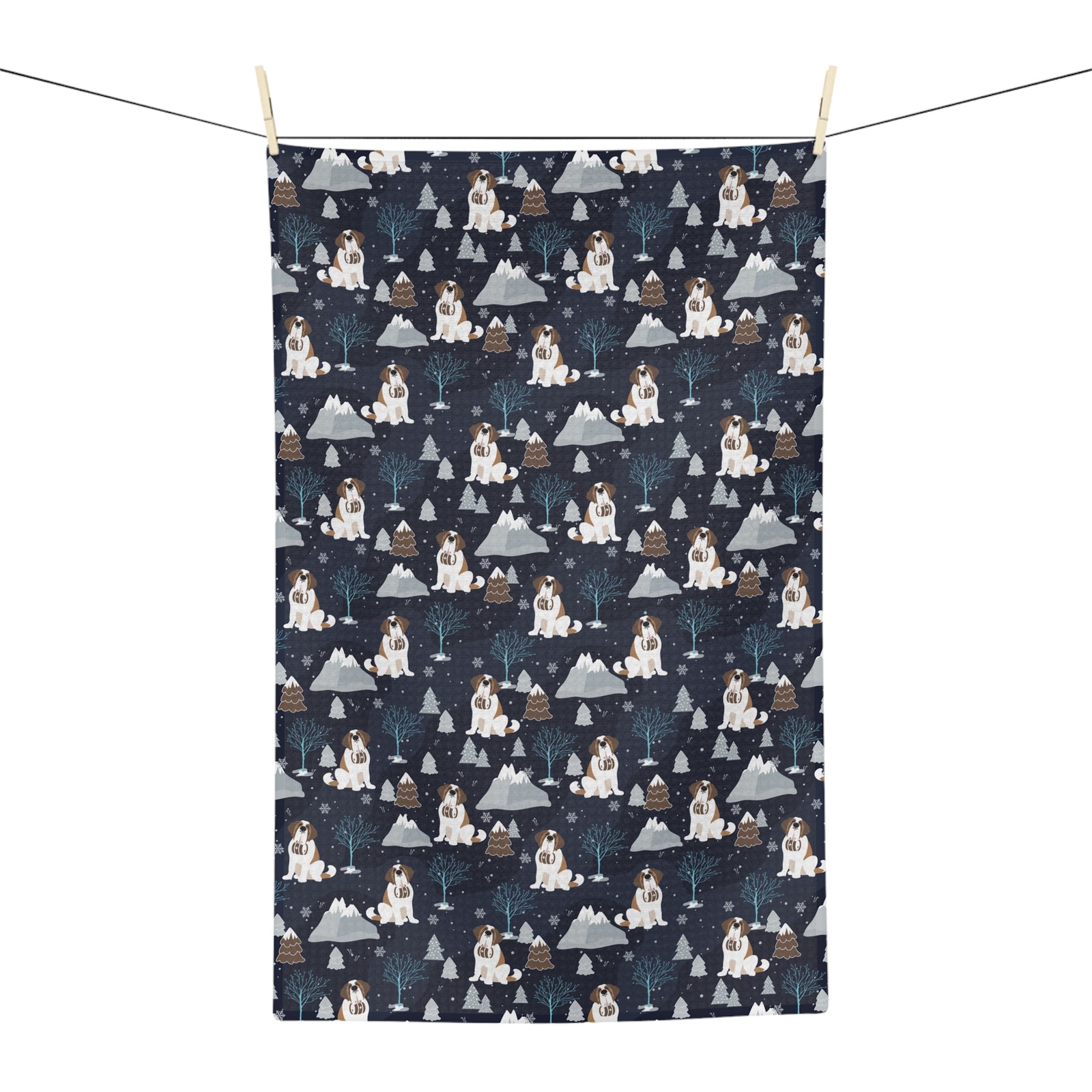 Alpine Chill Saint Bernard microfiber tea towel with a navy print of Saint Bernards with rescue barrels among frosty trees and snowy mountains.