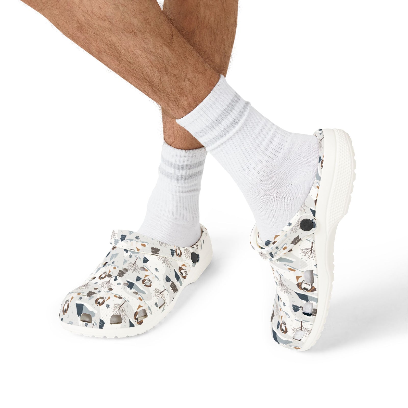 White EVA clog shoes with an all-over alpine mountain pattern featuring pines and Saint Bernards by Lucy and Norman