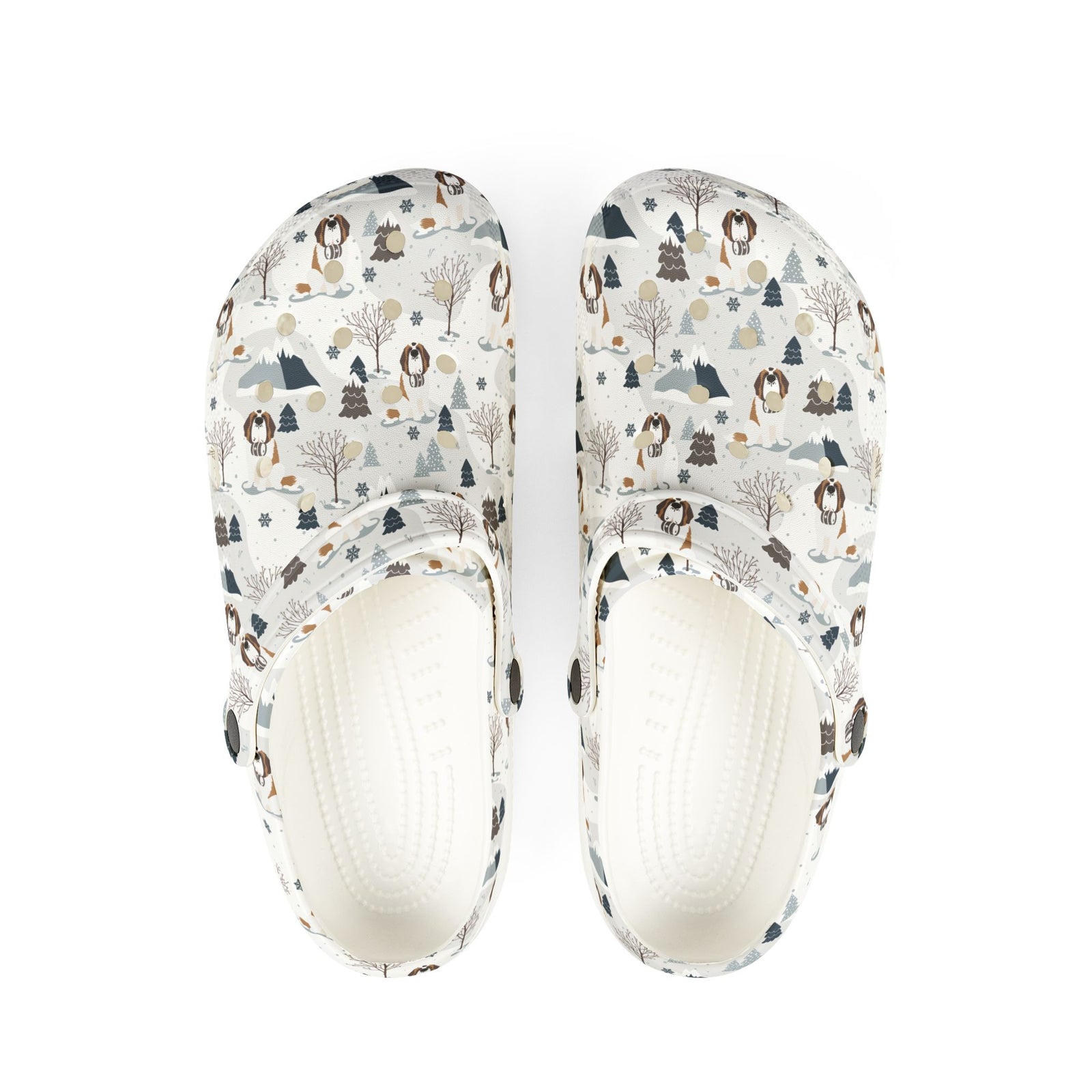 White EVA clog shoes with an all-over alpine mountain pattern featuring pines and Saint Bernards by Lucy and Norman