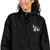 Black Champion packable windbreaker with chest embroidered Saint Bernard and barrel, half zip pullover with hood, kangaroo pocket, and zip pouch.