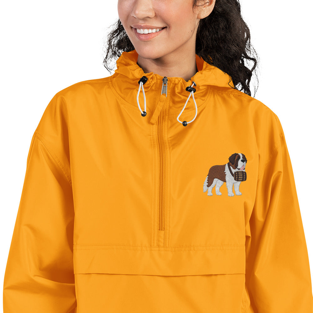 Gold Champion packable windbreaker with chest embroidered Saint Bernard and barrel, half zip pullover with hood, kangaroo pocket, and zip pouch.