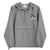 Light gray Champion packable windbreaker with chest embroidered Saint Bernard and barrel, half zip pullover with hood, kangaroo pocket, and zip pouch.