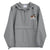 Light gray Champion packable windbreaker with chest embroidered Saint Bernard and barrel, half zip pullover with hood, kangaroo pocket, and zip pouch.
