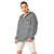 Light gray Champion packable windbreaker with chest embroidered Saint Bernard and barrel, half zip pullover with hood, kangaroo pocket, and zip pouch.