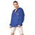 Royal blue Champion packable windbreaker with chest embroidered Saint Bernard and barrel, half zip pullover with hood, kangaroo pocket, and zip pouch.
