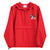 Red Champion packable windbreaker with chest embroidered Saint Bernard and barrel, half zip pullover with hood, kangaroo pocket, and zip pouch.