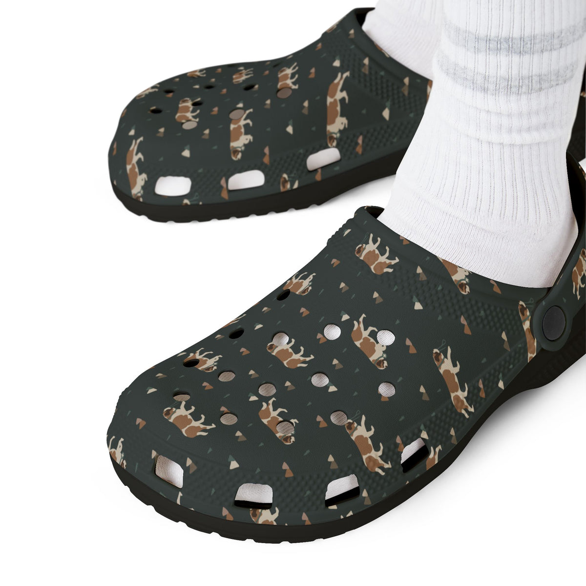 Black EVA clog shoes with an all-over forest green Saint Bernard and mountain pattern by Lucy and Norman