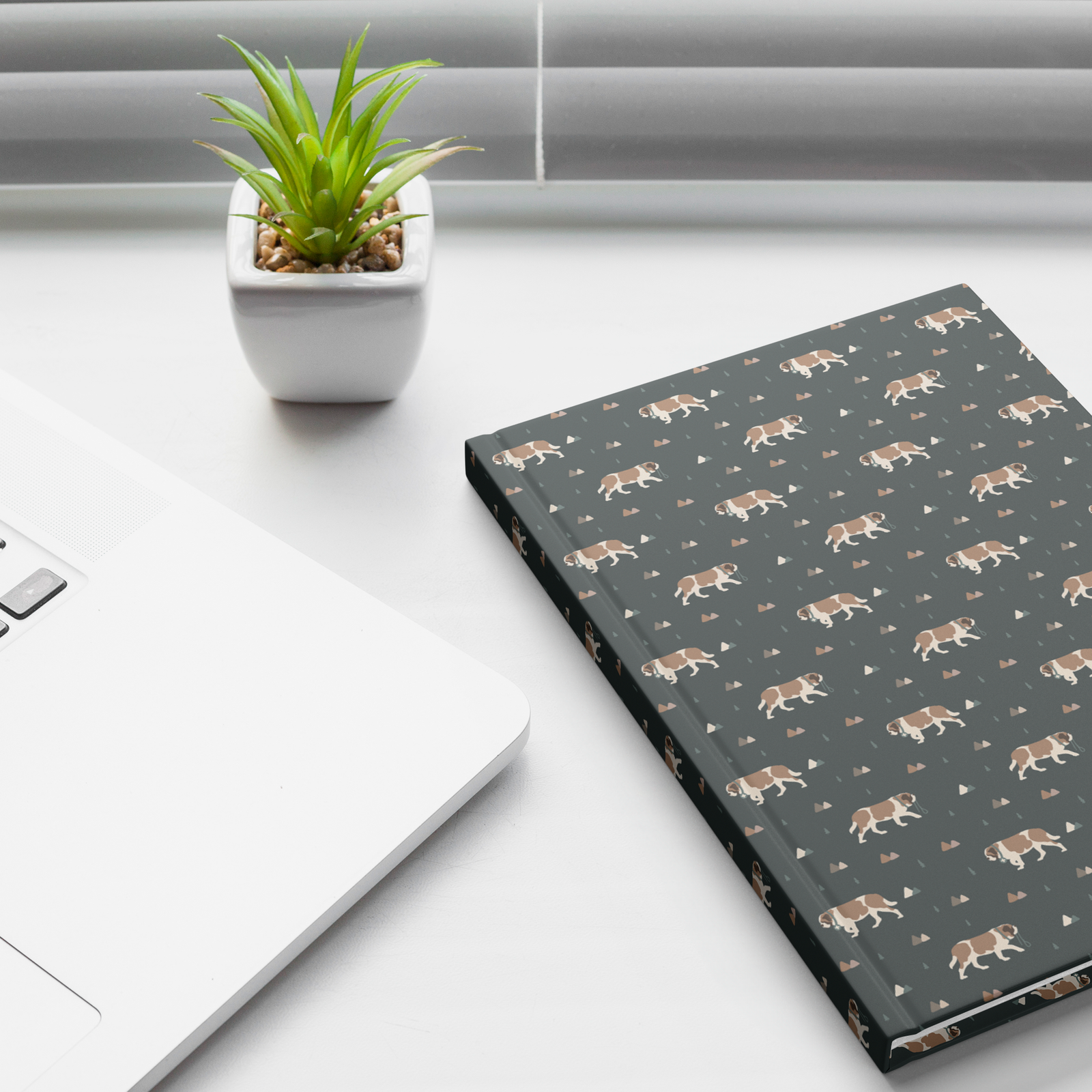 Green Mountain Saint Bernard hardcover lined journal with a forest-green cover featuring Saint Bernards walking among mountains and pine trees.
