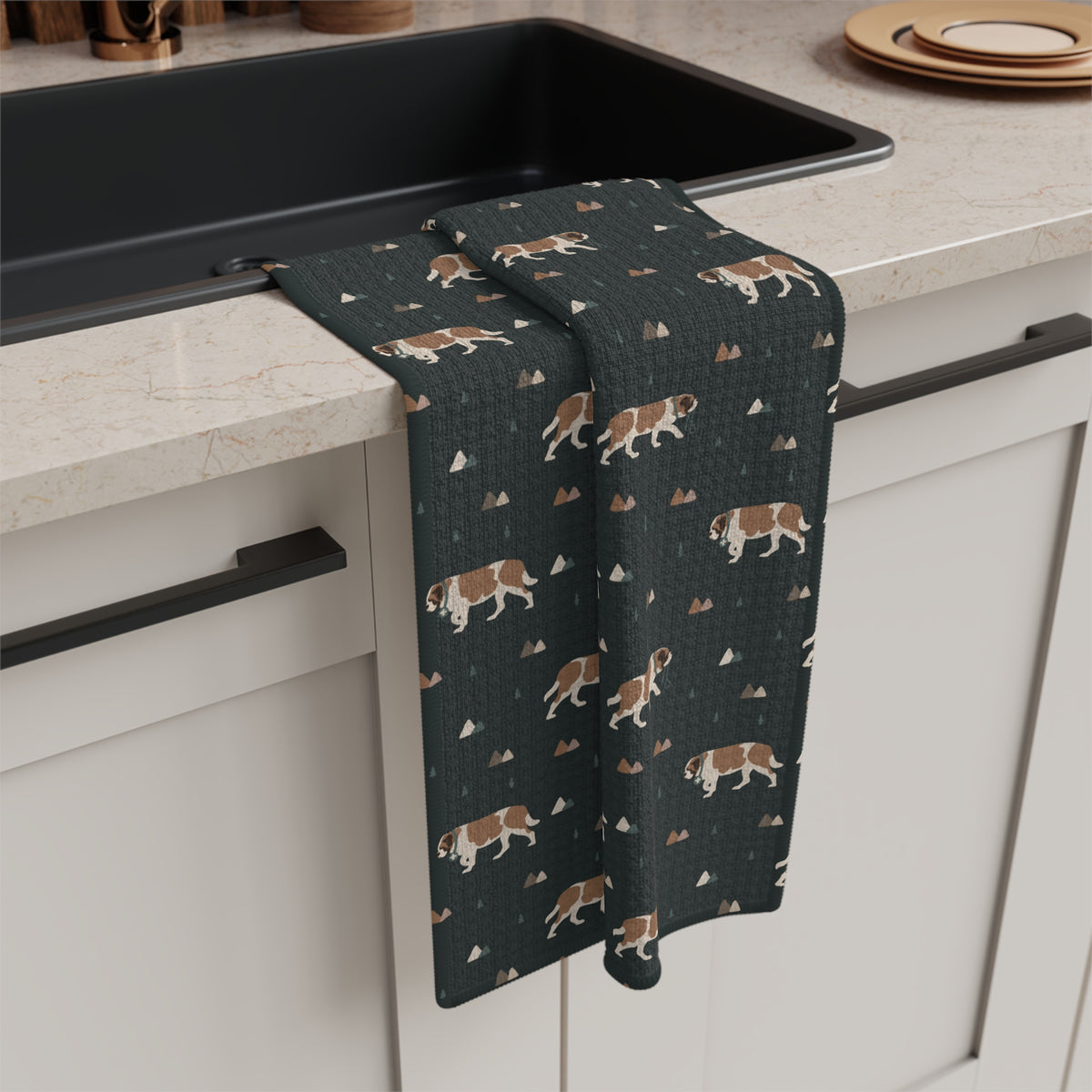 Green Mountain Saint Bernard microfiber tea towel with a forest-green print of Saint Bernards walking among mountains and pine trees.