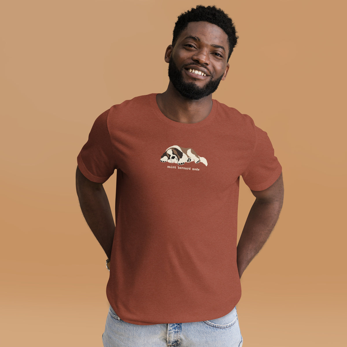 Lightweight t-shirt in clay with a sleeping Saint Bernard illustration and 'saint bernard mode' text" by Lucy + Norman.