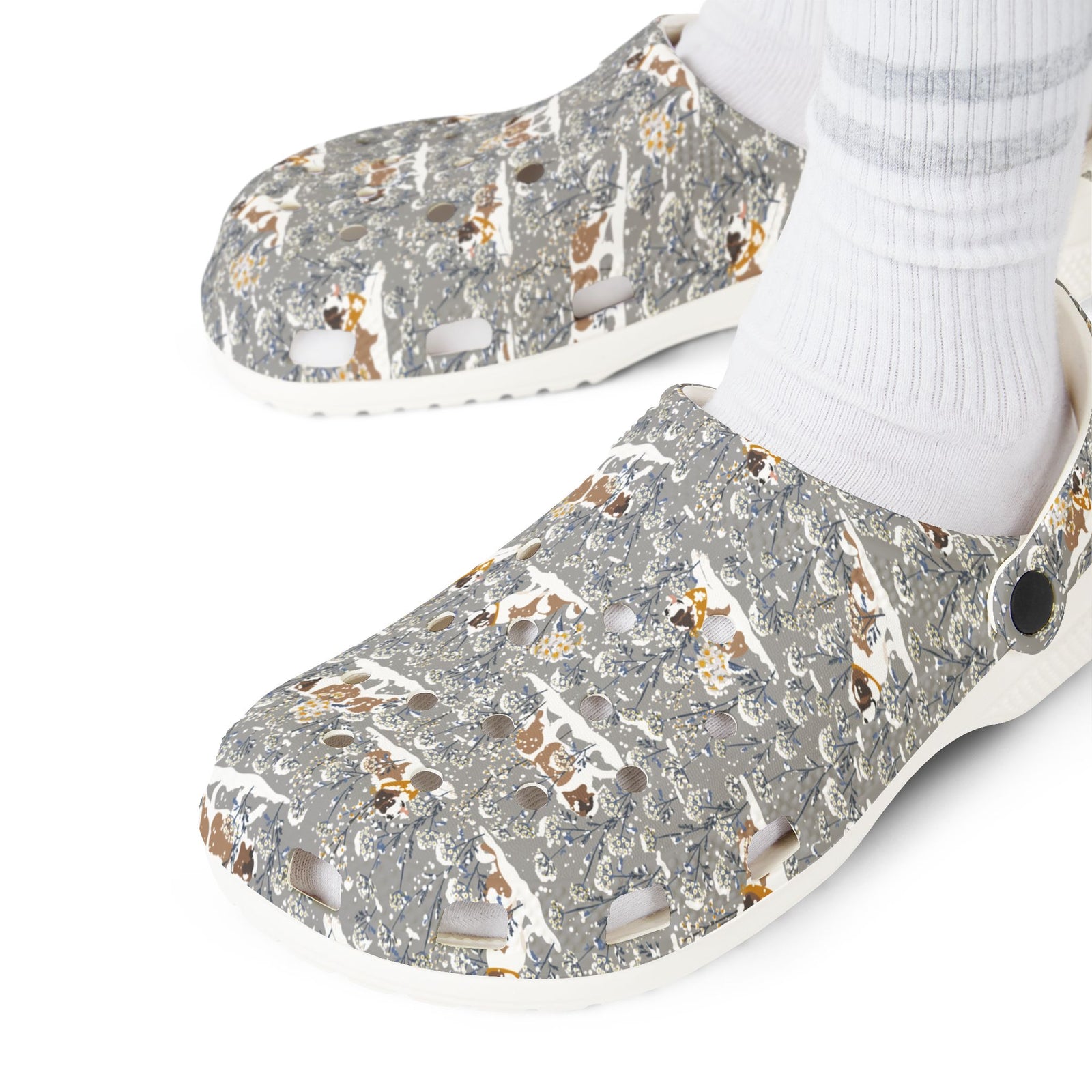 White EVA clog shoes with an all-over gray Saint Bernard pattern with snowy florals by Lucy and Norman