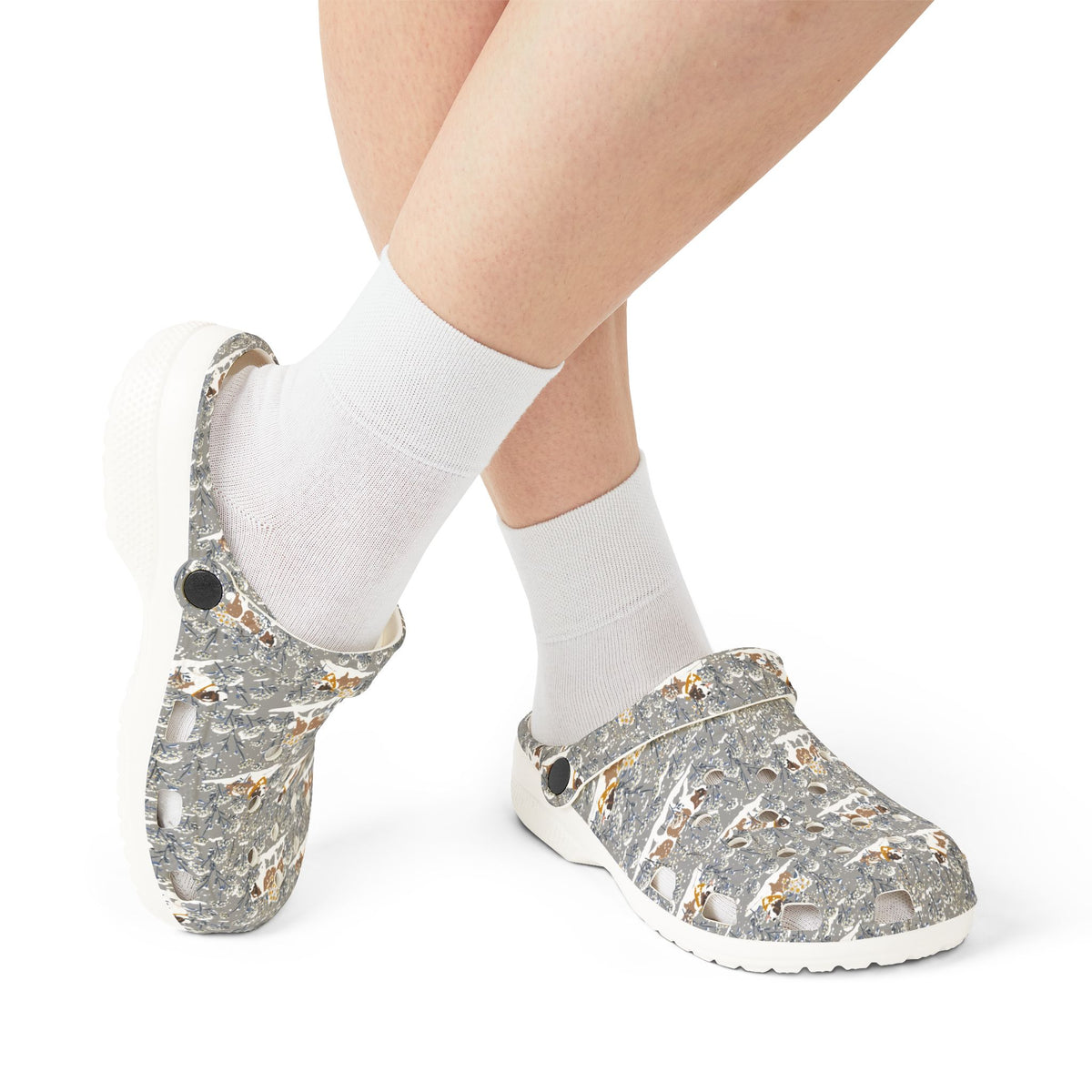 White EVA clog shoes with an all-over gray Saint Bernard pattern with snowy florals by Lucy and Norman