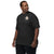 Comfort Colors black t-shirt featuring a woodland-mountain theme with Saint Bernard dogs on the back with a badge on left chest. Perfect Saint Bernard gift for dog lovers.