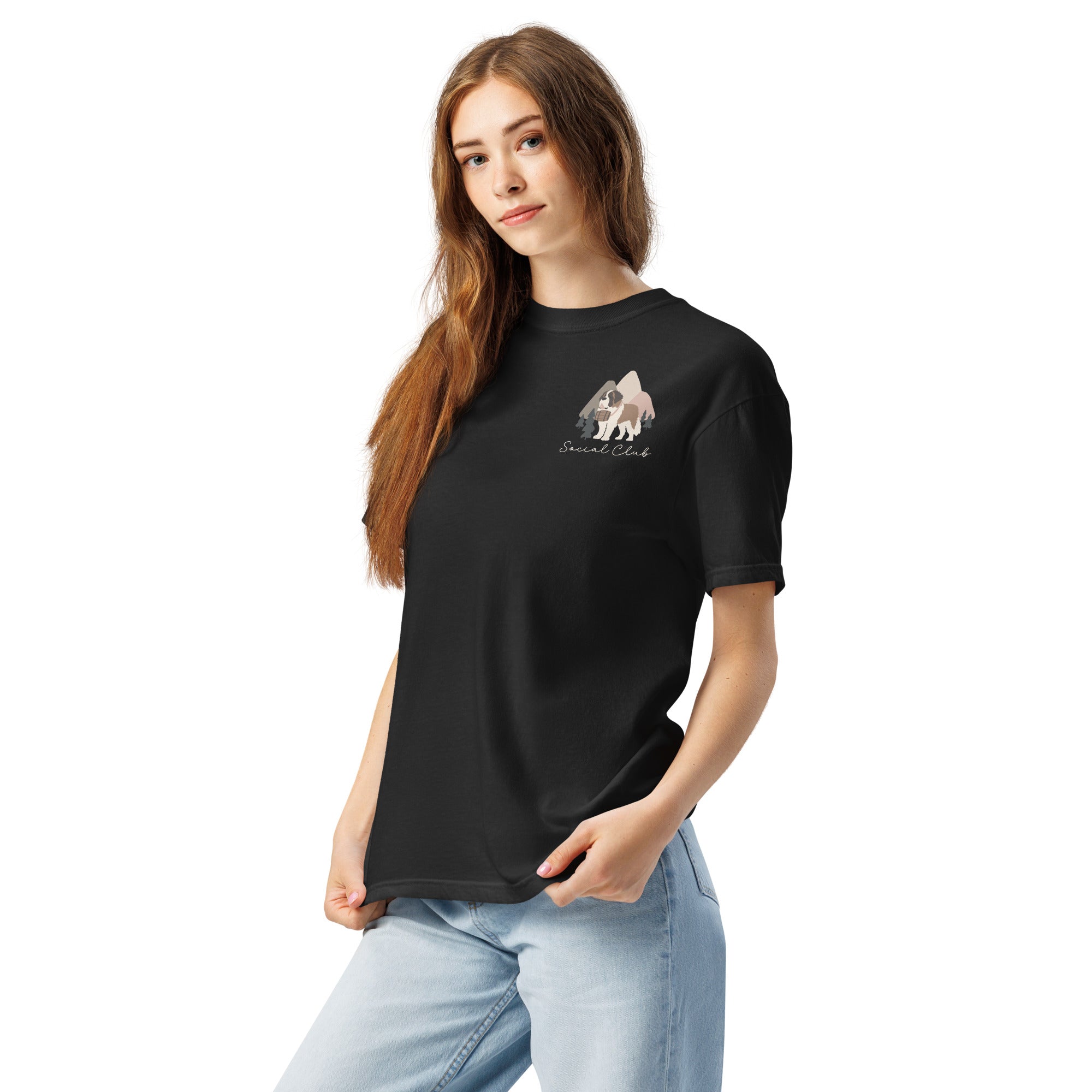 Comfort Colors black t-shirt featuring a woodland-mountain theme with Saint Bernard dogs on the back with a badge on left chest. Perfect Saint Bernard gift for dog lovers.