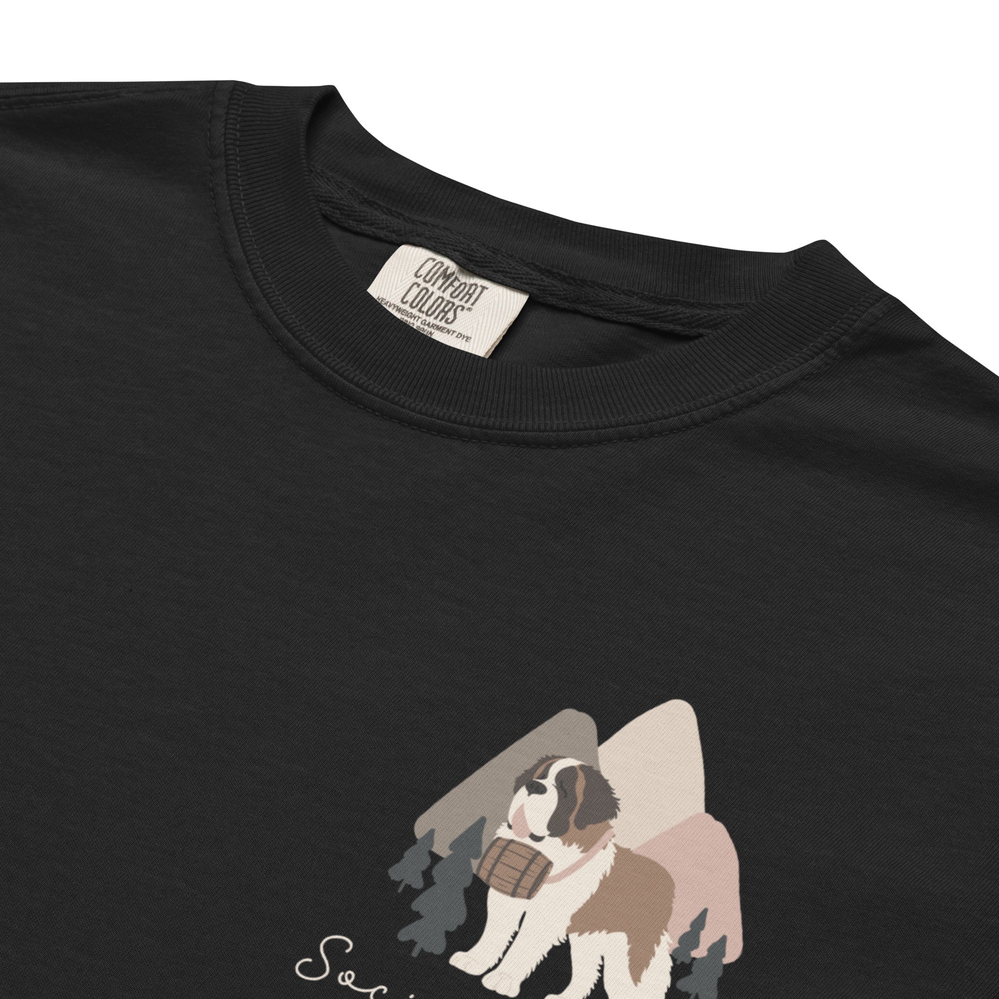 Comfort Colors black t-shirt featuring a woodland-mountain theme with Saint Bernard dogs on the back with a badge on left chest. Perfect Saint Bernard gift for dog lovers.