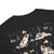 Comfort Colors black t-shirt featuring a woodland-mountain theme with Saint Bernard dogs on the back with a badge on left chest. Perfect Saint Bernard gift for dog lovers.
