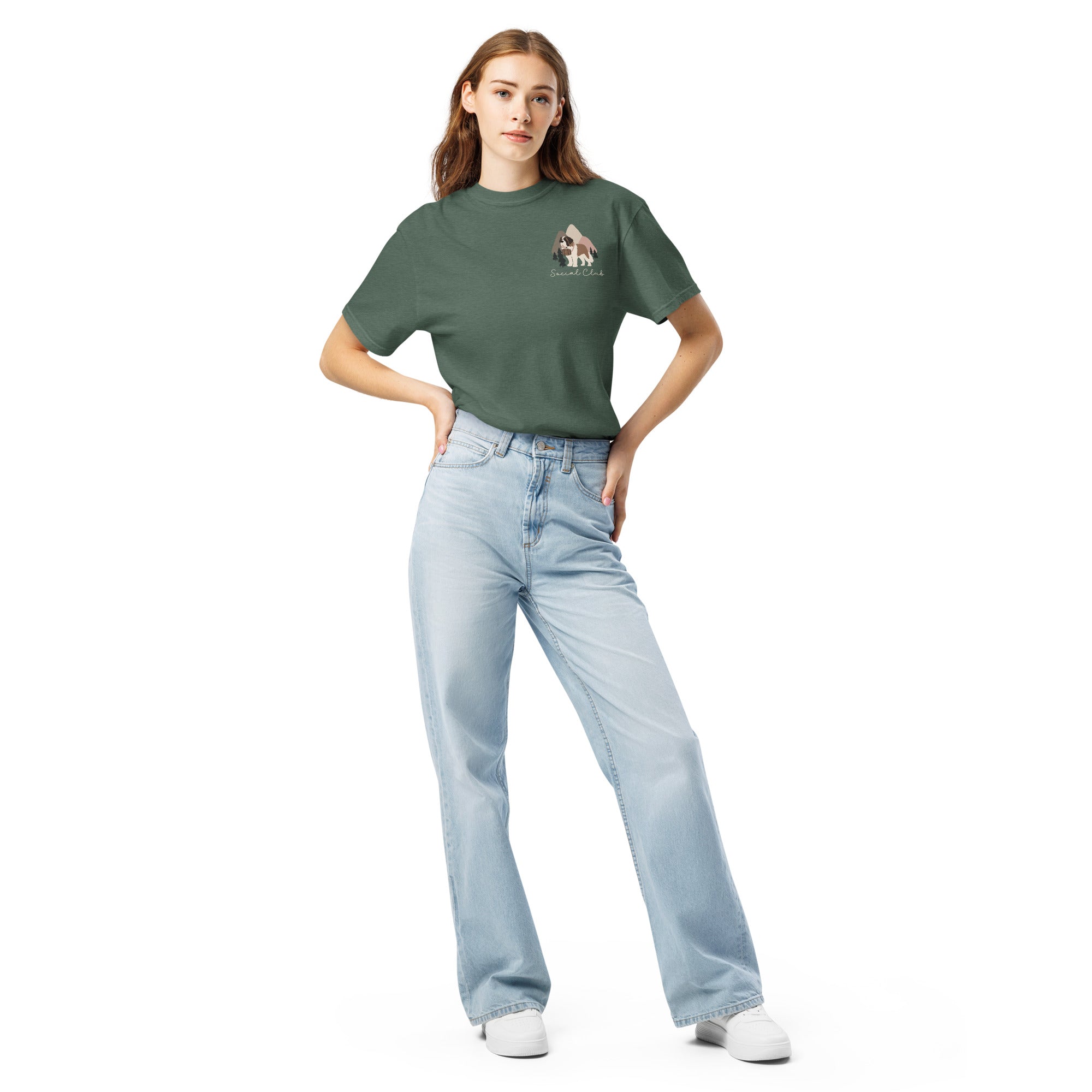 Comfort Colors blue spruce t-shirt featuring a woodland-mountain theme with Saint Bernard dogs on the back with a badge on left chest. Perfect Saint Bernard gift for dog lovers.