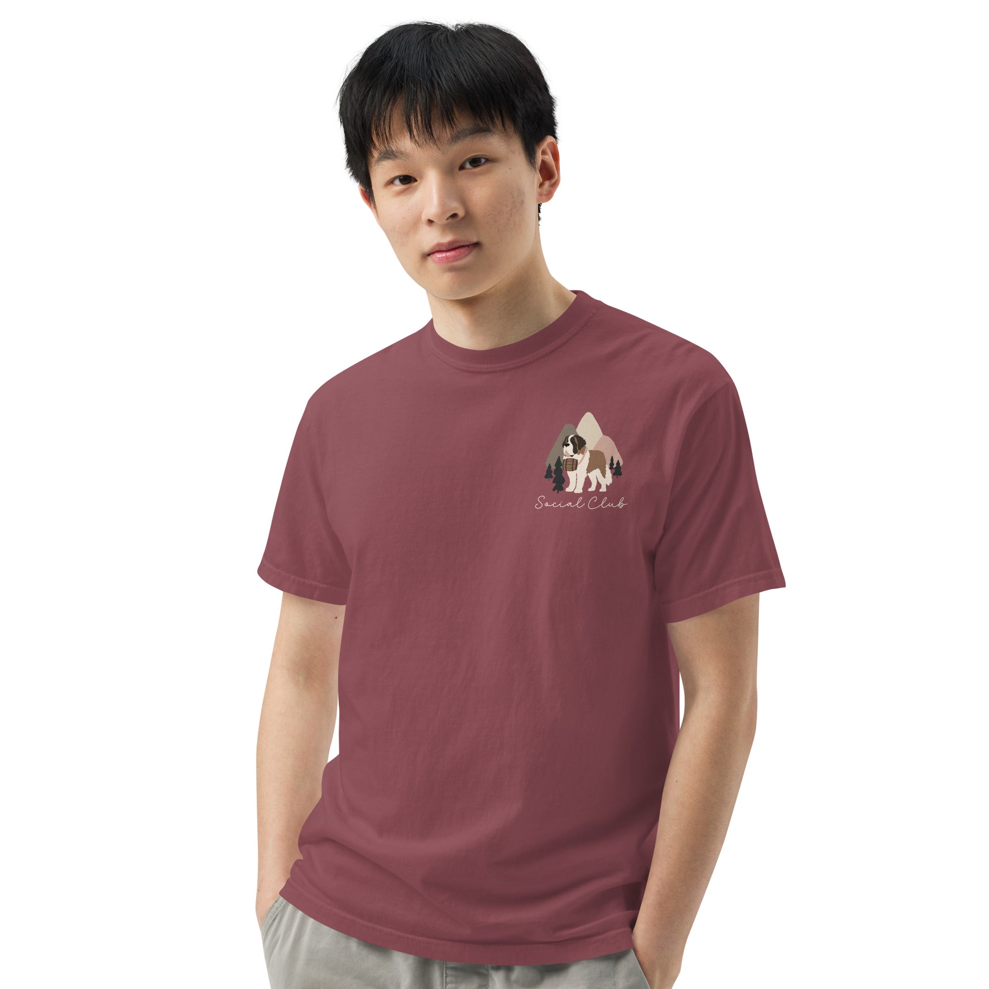 Comfort Colors brick t-shirt featuring a woodland-mountain theme with Saint Bernard dogs on the back with a badge on left chest. Perfect Saint Bernard gift for dog lovers.