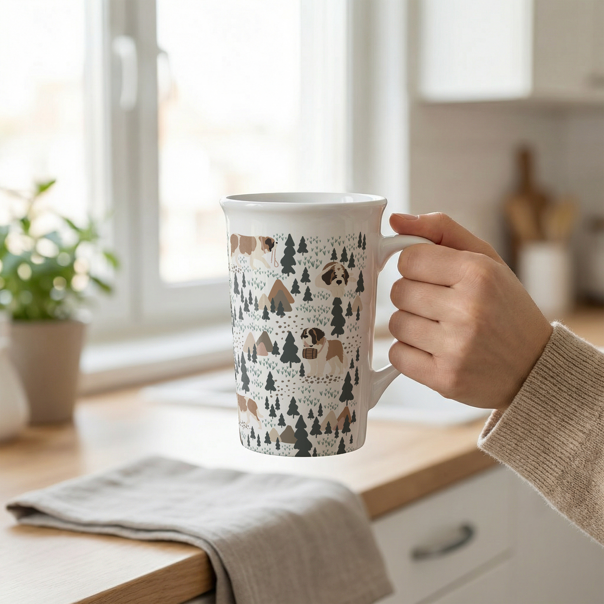 Woodland Saint Bernard 16oz grande mug with a white finish featuring Saint Bernards among pine trees and little mountains, with a removable silicone lid.