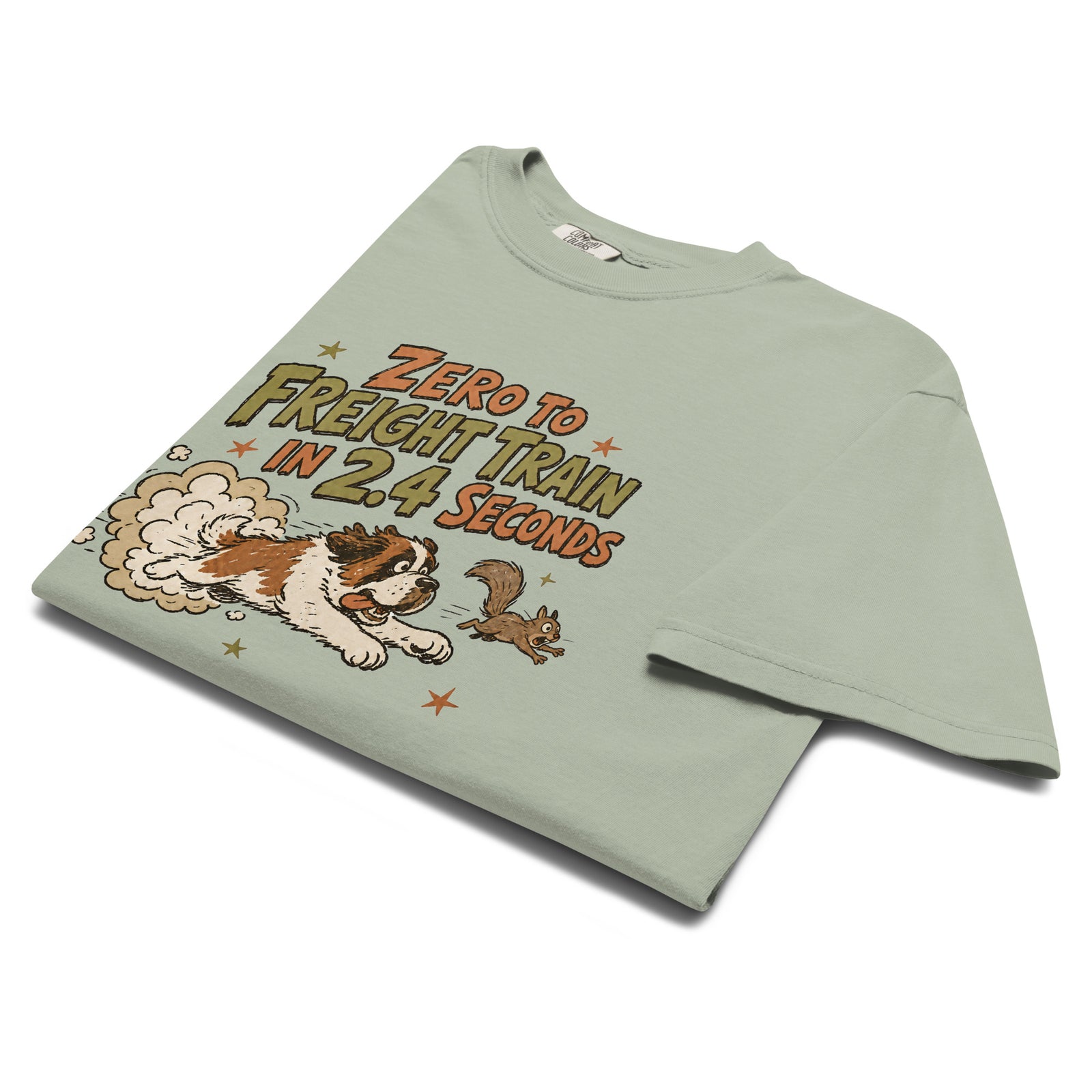 Bay green Comfort Colors t-shirt with a retro earth tone cartoon of a funny Saint Bernard chasing a squirrel and Zero to Freight Train in 2.4 Seconds lettering.