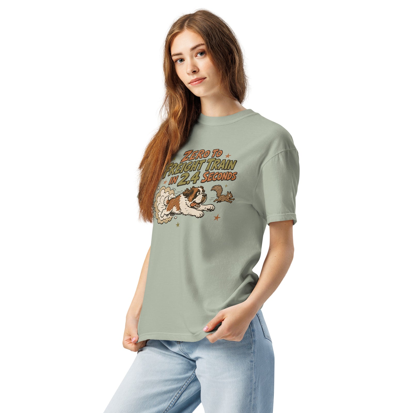 Bay green Comfort Colors t-shirt with a retro earth tone cartoon of a funny Saint Bernard chasing a squirrel and Zero to Freight Train in 2.4 Seconds lettering.