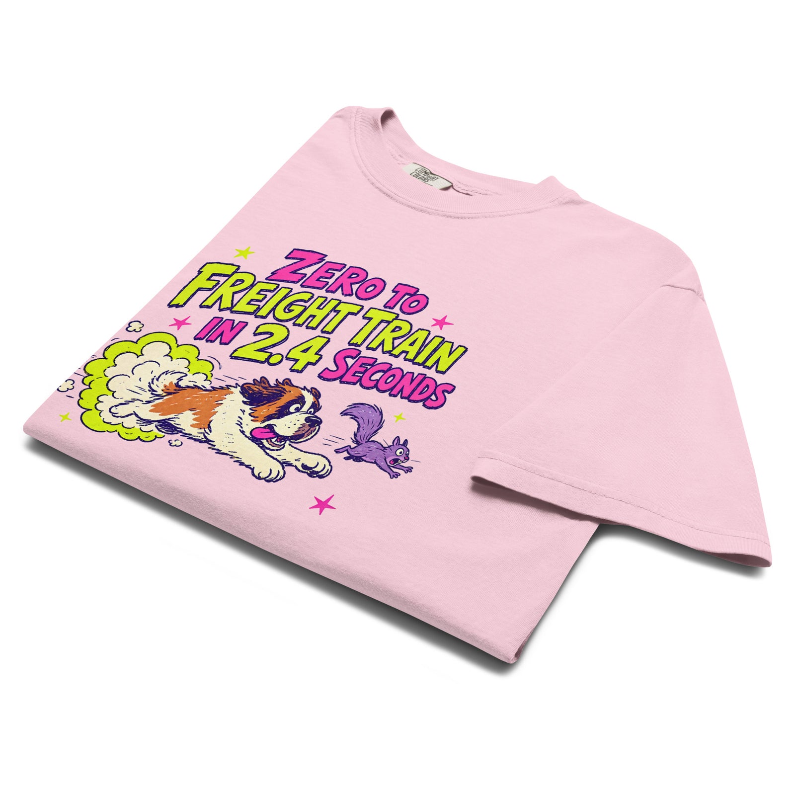 Blossom pink Comfort Colors t-shirt with a bright retro cartoon Saint Bernard chasing a squirrel and Zero to Freight Train in 2.4 Seconds lettering.
