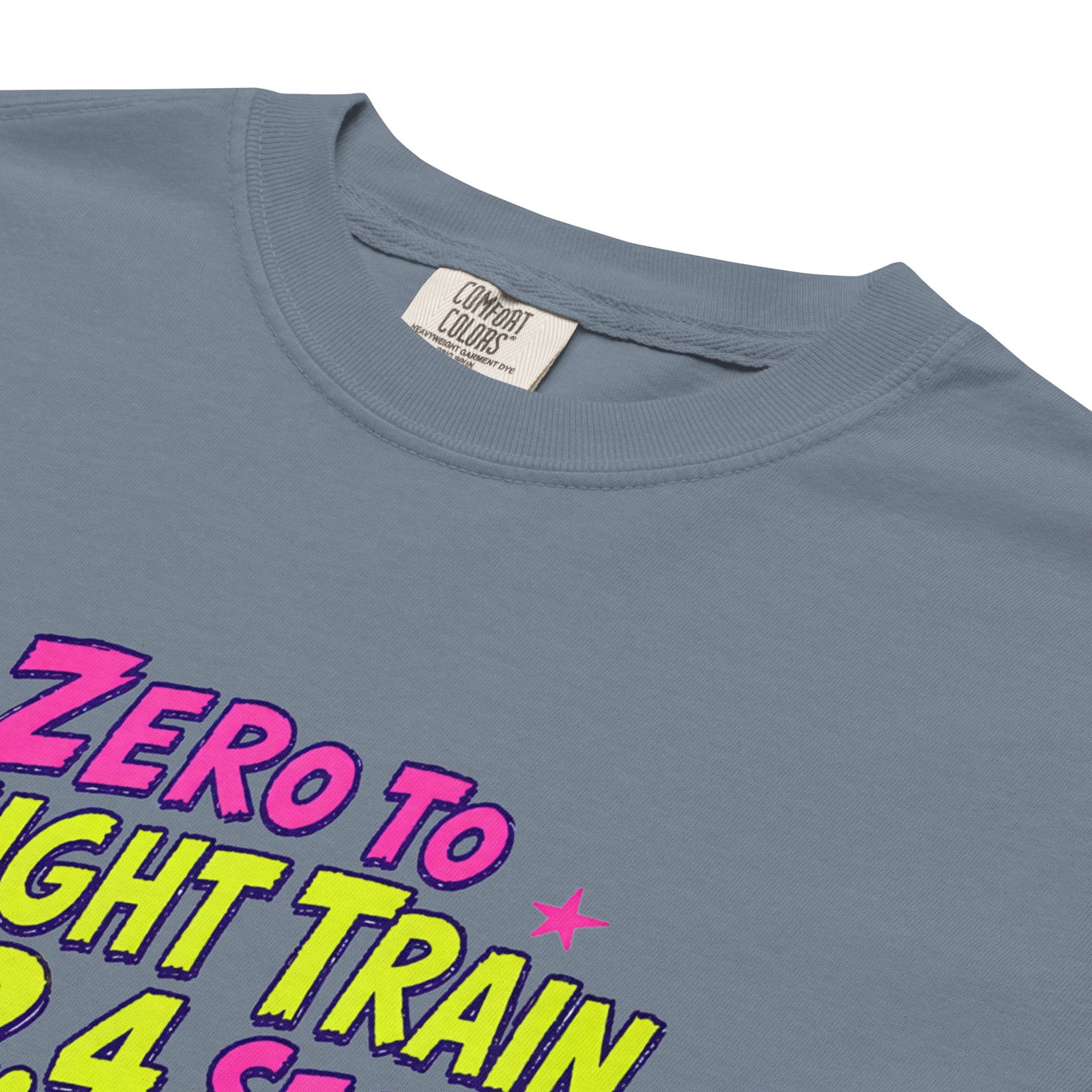 Blue Jean Comfort Colors t-shirt with a bright retro cartoon Saint Bernard chasing a squirrel and Zero to Freight Train in 2.4 Seconds lettering.