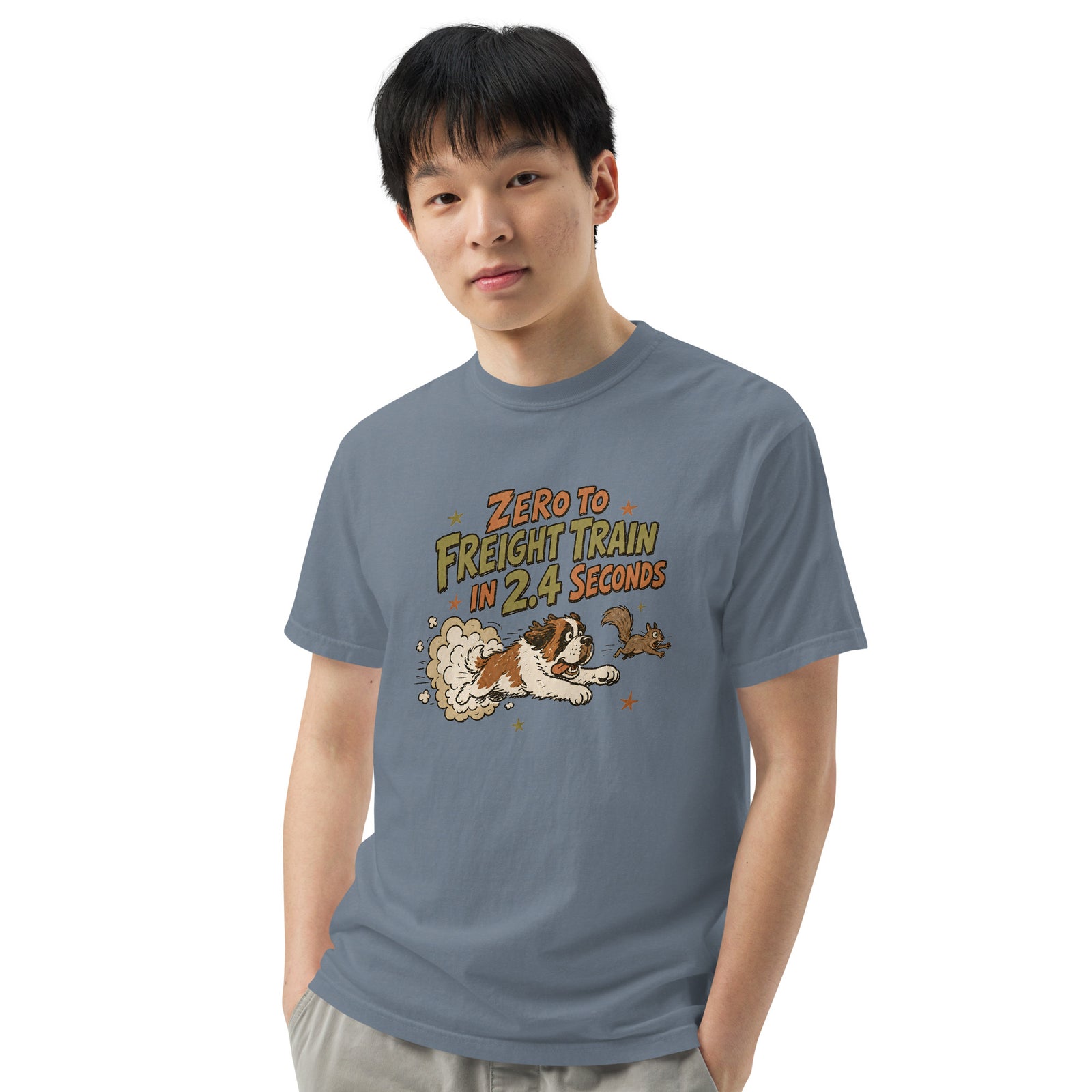 Blue jean Comfort Colors t-shirt with a retro earth tone cartoon of a funny Saint Bernard chasing a squirrel and Zero to Freight Train in 2.4 Seconds lettering.