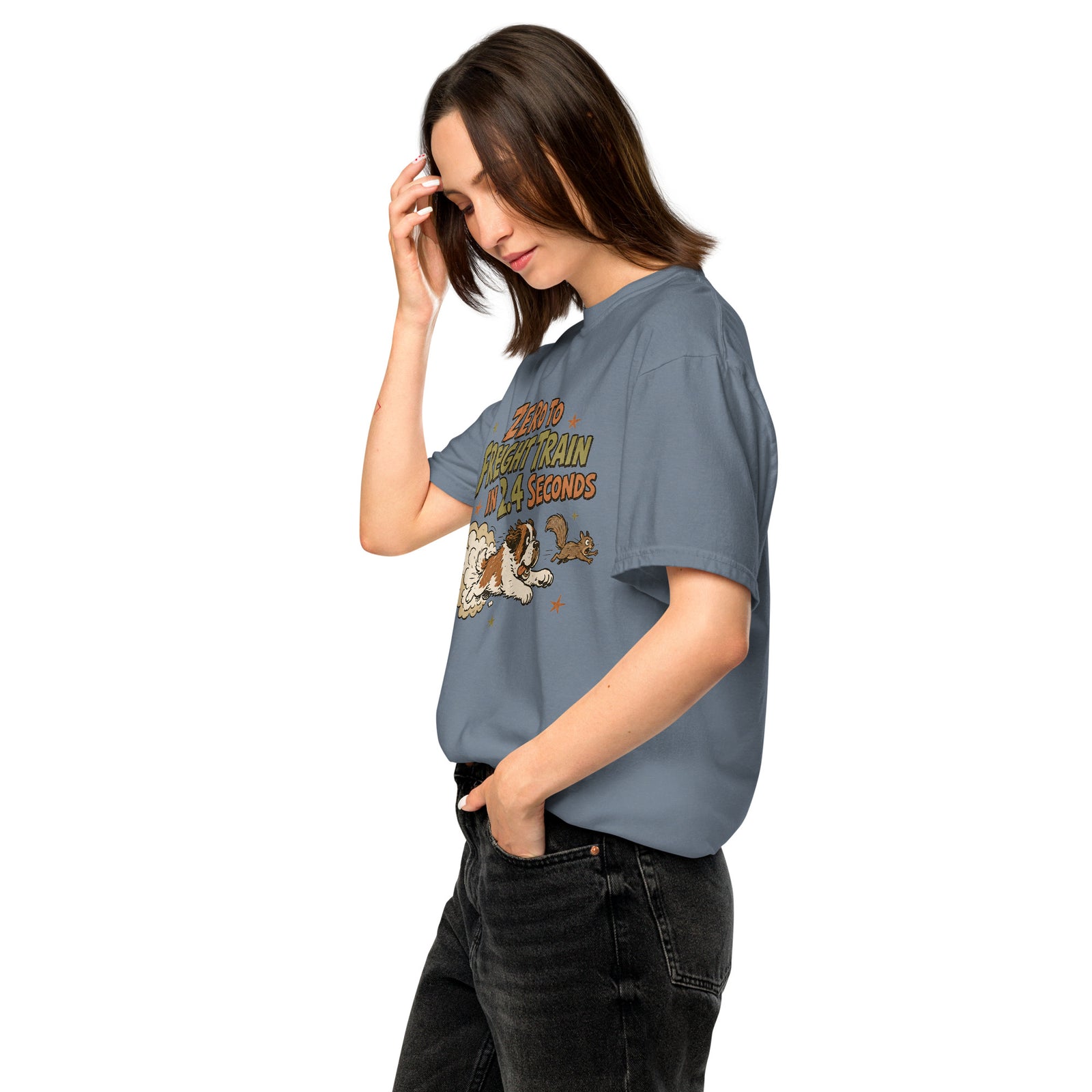 Blue jean Comfort Colors t-shirt with a retro earth tone cartoon of a funny Saint Bernard chasing a squirrel and Zero to Freight Train in 2.4 Seconds lettering.