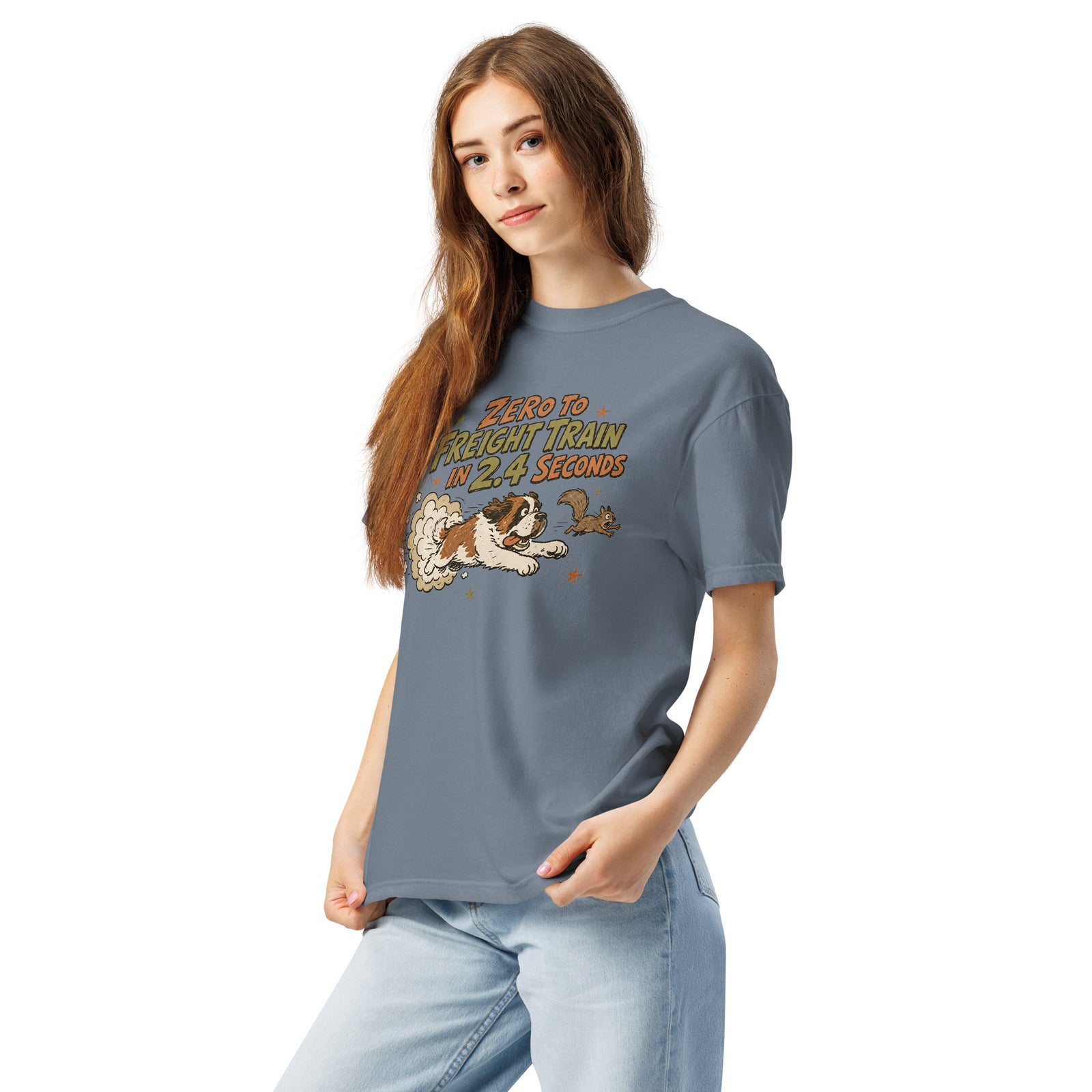 Blue jean Comfort Colors t-shirt with a retro earth tone cartoon of a funny Saint Bernard chasing a squirrel and Zero to Freight Train in 2.4 Seconds lettering.